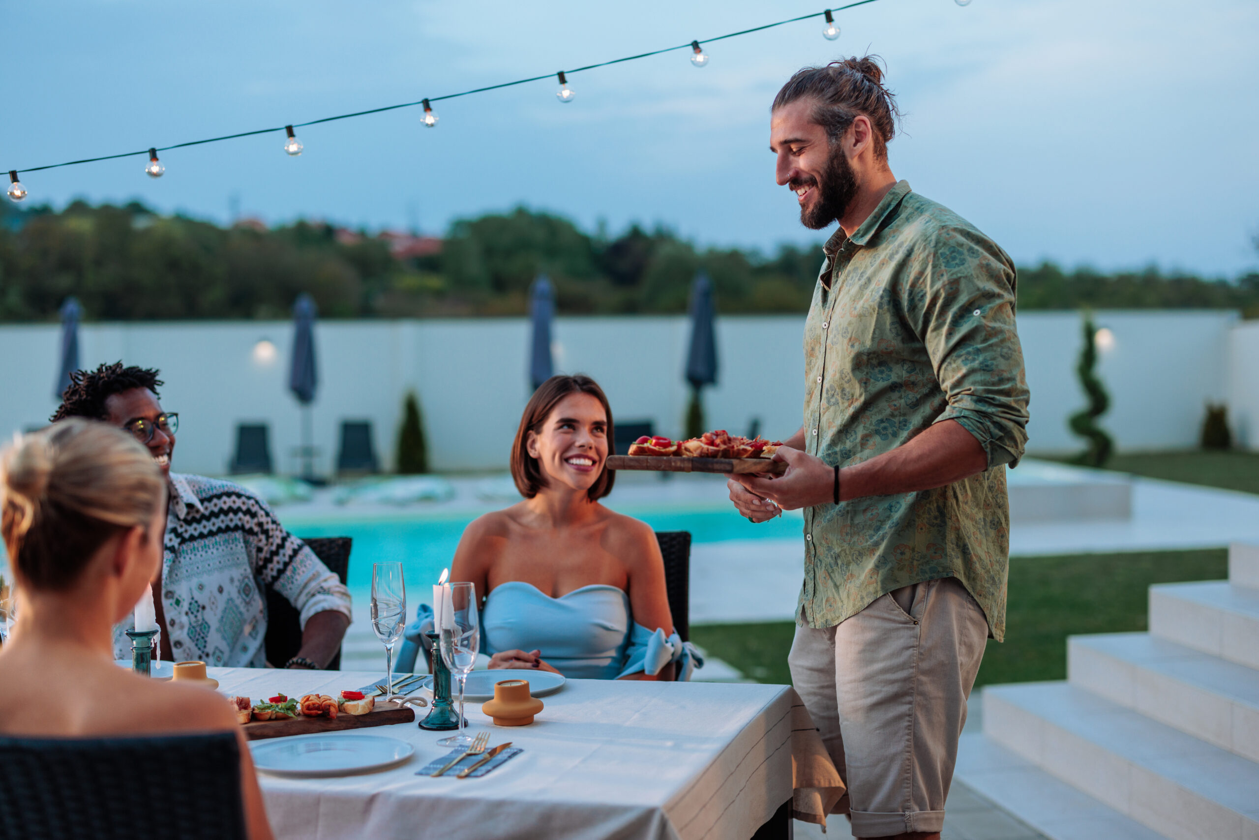 Outdoor dinner with guests and food at st thomas wedding venue